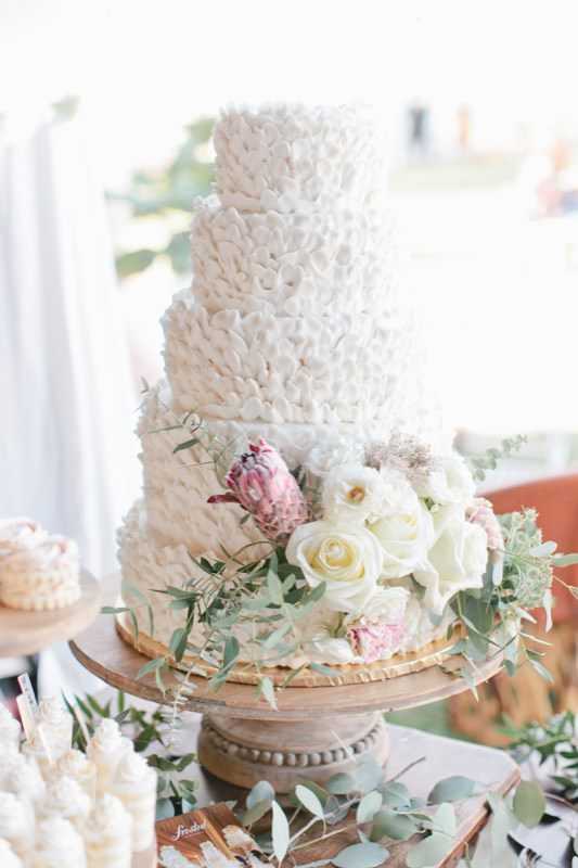 wedding dessert table vanilla cake shooters french macaroons vintage shabby chic barn wedding cake buttercream ruffles